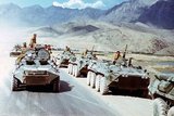 The Soviet War in Afghanistan was a nine-year conflict involving the Soviet Union, supporting the Marxist government of the Democratic Republic of Afghanistan  against the indigenous Afghan Mujahideen and foreign ‘Arab–Afghan’ volunteers. The mujahideen found other support from a variety of sources including the United States, Saudi Arabia, the United Kingdom, Pakistan, Egypt, China and other nations. The Afghan war became a proxy war in the broader context of the late Cold War. The initial Soviet deployment of the 40th Army in Afghanistan began on December 24, 1979 under Soviet premier Leonid Brezhnev. The final troop withdrawal started on May 15, 1988, and ended on February 15, 1989 under the last Soviet leader Mikhail Gorbachev.