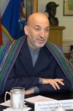 Hamid Karzai (24 December 1957 - ) is the 12th and current President of Afghanistan, taking office on 7 December 2004. He became a dominant political figure after the removal of the Taliban regime in late 2001.<br/><br/>

During the December 2001 International Conference on Afghanistan in Germany, Karzai was selected by prominent Afghan political figures to serve a six-month term as chairman of the Interim administration. He was then chosen for a two-year term as Interim President during the 2002 'loya jirga' (grand assembly) that was held in Kabul.<br/><br/>

After the 2004 presidential election, Karzai was declared winner and became President of the Islamic Republic of Afghanistan. He controversially won a second five-year term in the disputed 2009 presidential election while admitting the elections were flawed.