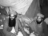 The Soviet War in Afghanistan was a nine-year conflict involving the Soviet Union, supporting the Marxist government of the Democratic Republic of Afghanistan against the indigenous Afghan Mujahideen and foreign ‘Arab–Afghan’ volunteers. The mujahideen found other support from a variety of sources including the United States, Saudi Arabia, the United Kingdom, Pakistan, Egypt, China and other nations. The Afghan war became a proxy war in the broader context of the late Cold War. The initial Soviet deployment of the 40th Army in Afghanistan began on December 24, 1979 under Soviet premier Leonid Brezhnev. The final troop withdrawal started on May 15, 1988, and ended on February 15, 1989 under the last Soviet leader Mikhail Gorbachev.