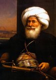Muhammad Ali Pasha al-Mas'ud ibn Agha (March 1769 – 2 August 1849) was an Albanian commander in the Ottoman army, who became Wāli (governor), and self-declared Khedive of Egypt and Sudan. Though not a modern nationalist, he is regarded as the founder of modern Egypt because of the dramatic reforms in the military, economic and cultural spheres that he instituted.<br/><br/>
 
During the infighting in Egypt between the Ottomans and Mamluks between 1801 and 1805, Muhammad Ali had carefully acted to gain the support of the general public. The Mamluks still posed the greatest threat to Muhammad Ali. They had controlled Egypt for more than 600 years, and over that time they had extended their rule extensively throughout Egypt.<br/><br/>
 
Muhammad Ali’s approach was to eliminate the Mamluk leadership, then move against the rank and file. On March 1, 1811, Muhammad Ali invited the Mamluk leaders to a celebration held at the Cairo Citadel in honor of his son, Tusun, who was being appointed to lead a military expedition into Arabia. When the Mamluks arrived, they were trapped and killed. After the leaders were killed, Muhammad Ali dispatched his army throughout Egypt to rout the remainder of the Mamluk forces.
Mohammad Ali came to rule Levantine territories outside Egypt. The Alawiyya dynasty that he established would rule Egypt and Sudan until the Egyptian Revolution of 1952.