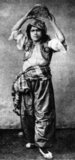 Turkey: A köçek was typically a very handsome young male rakkas or ‘dancer’, usually cross-dressed in feminine attire, employed as an entertainer.