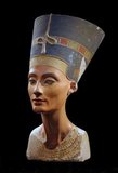 Nefertiti  (c. 1370 BCE – c. 1330 BCE) was the Great Royal Wife of the Egyptian Pharaoh Akhenaten . Nefertiti and Akhenaten were known for a religious revolution, in which they started to worship one god only. This was the Sun God Aten. She is also famous for her bust, now in Berlin's Neues Museum. Some scholars believe that Nefertiti ruled briefly after her husband's death and before the accession of Tutankhamun as Smenkhkare, although this identification is a matter of ongoing debate.