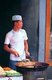 China: A Hui Muslim cooks street food in Xi'an's Muslim Quarter, Shaanxi Province