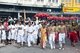 Thailand: The 'Ma Song' (entranced devotees) and their attendants pass through the streets of Phuket Town, Phuket Vegetarian Festival